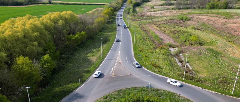 Aerial view of roundabout to illustrate vehicle positioning.